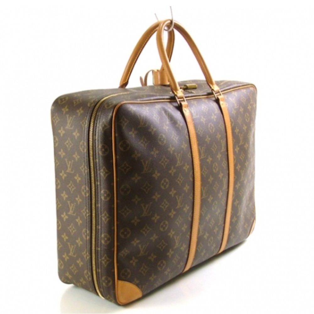 Louis Vuitton leather suitcase